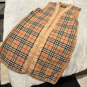 Burberry’s coat liner, worn as a vest